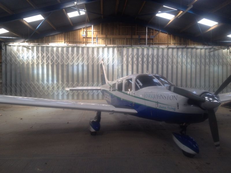 Mark Johnston Racing Folding Sliding Hangar Door Mark Johnston Racing Folding Sliding Hangar Door