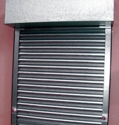 Safedrive motor unit for industrial roller shutters